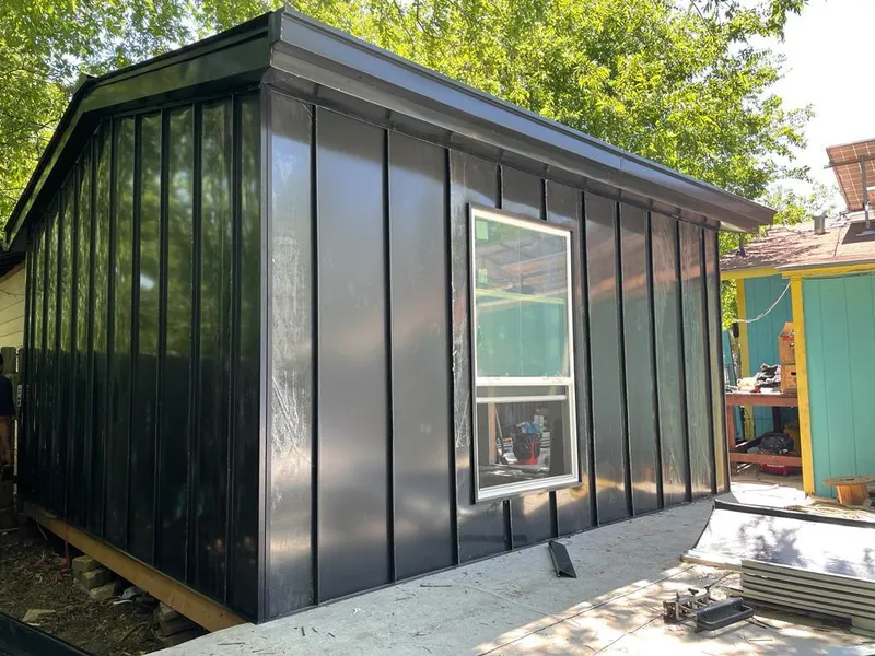 Black standing seam metal wall panels for Roof Inspection in Northbridge